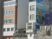 Puerto de Malpica. Mural de Urbano Lugrís