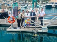1 En el marco de su compromiso con el medioambiente imagin instala en la marina del Real Club Náutico de Gran Canaria un dispositivo para recoger residuos del mar