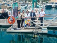 1 En el marco de su compromiso con el medioambiente imagin instala en la marina del Real Club Náutico de Gran Canaria un dispositivo para recoger residuos del mar