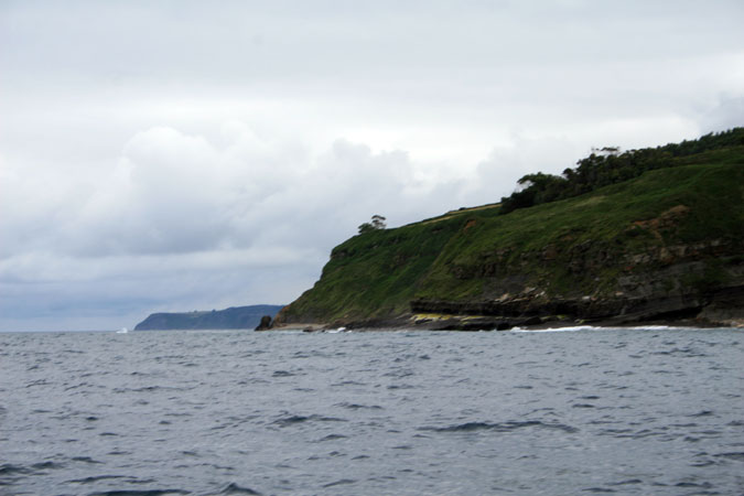 Punta del Olivo desde el E. Al fondo Cabo Lastres Punta del Olivo desde el E. Al fondo Cabo Lastres